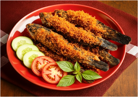 Ikan gabus serundeng laos menjadi menggugah selera karena perpaduan rasa gurih ikan dengan rempah aromatik.