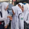 Murid SMP merayakan kelulusan dengan sederhana. Foto Ilustrasi Murid SMP merayakan kelulusan dengan sederhana. Foto Ilustrasi