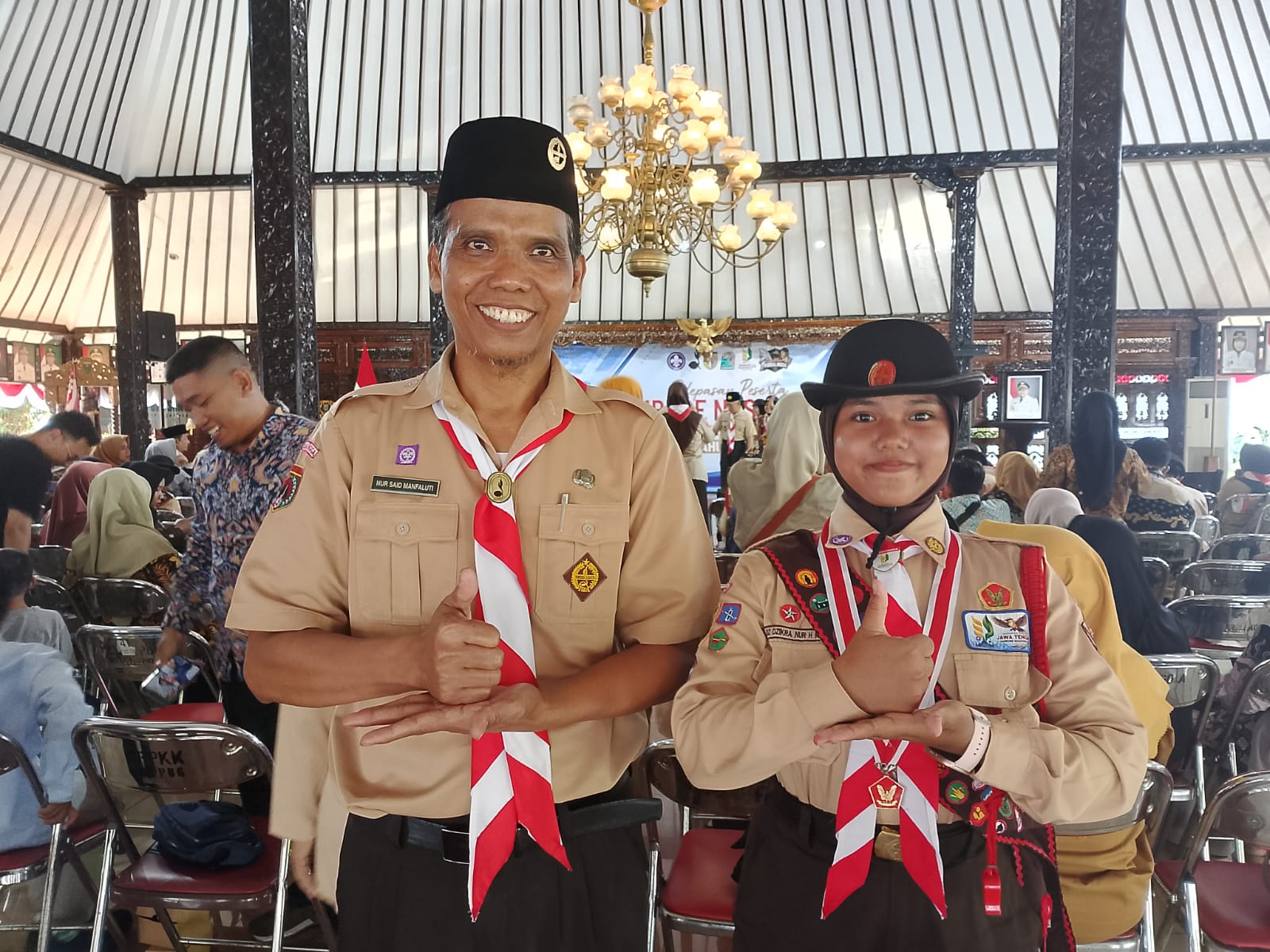 Adz Dzikra Nur Hidayah Miftakhi bersama Ketua Majelis Pembimbing Gugus Depan 03.07.501-502 pangkalan SMP Negeri 1 Mrebet, Kak Nur Said Manfaluti saat pelepasan kontingen Jamnas XII Tahun 2026 dari Kwarcab Purbalingga di Pendopo Dipokusumo, Senin 10 Agustus 2026 Adz Dzikra Nur Hidayah Miftakhi bersama Ketua Majelis Pembimbing Gugus Depan 03.07.501-502 pangkalan SMP Negeri 1 Mrebet, Kak Nur Said Manfaluti saat pelepasan kontingen Jamnas XII Tahun 2026 dari Kwarcab Purbalingga di Pendopo Dipokusumo, Senin 10 Agustus 2026